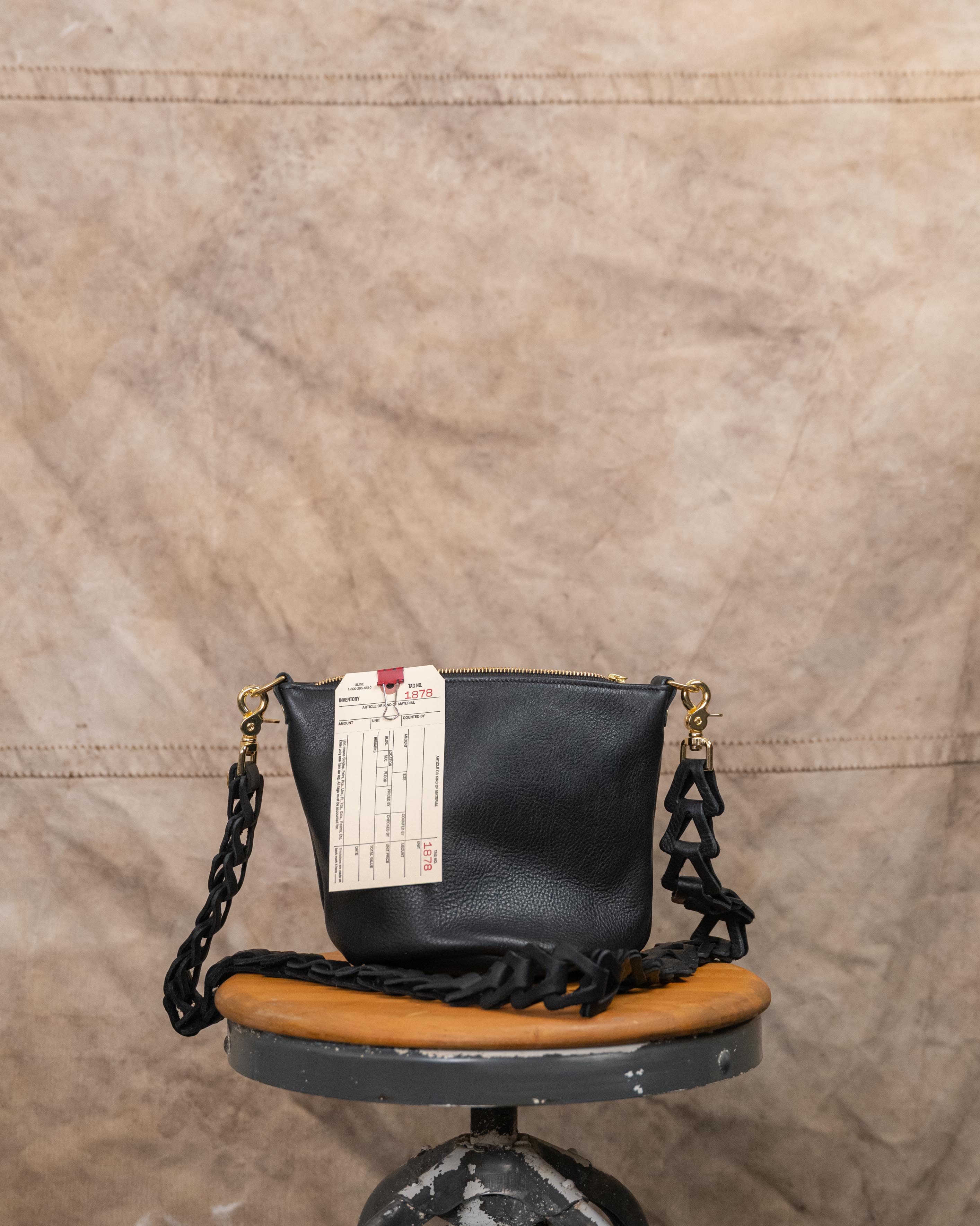 1878 Black Cyprus Mini Zip Top Bucket Bag with chain link strap