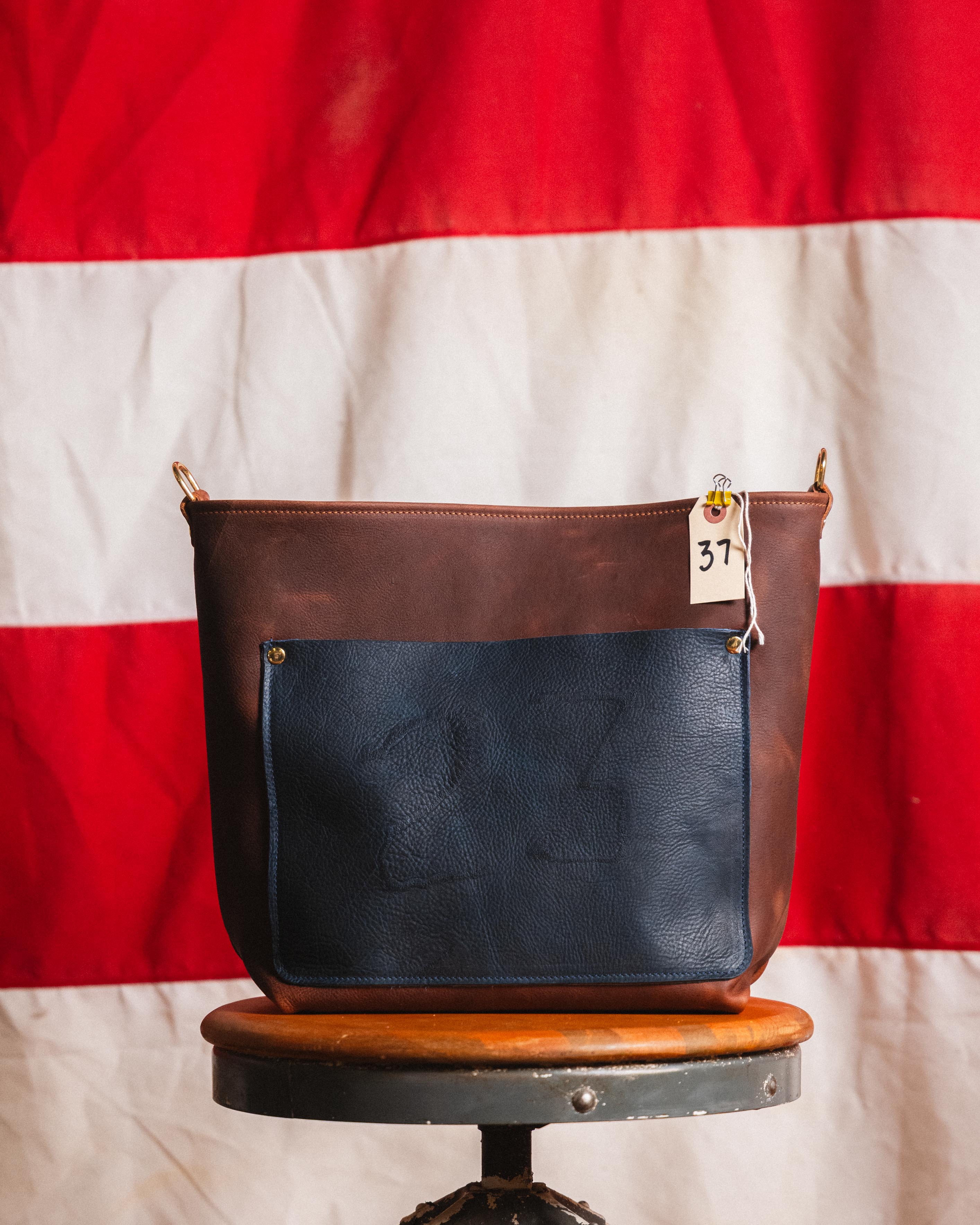 37. Branded Crossbody Tote (Tan and Navy Kodiak) Crossbody Travel Tote (no zipper)
