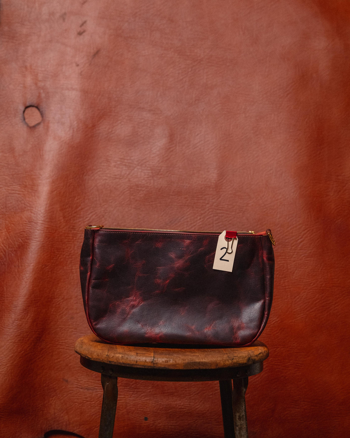 2. Violet Rustic Bison Crossbody Bag (scratched)