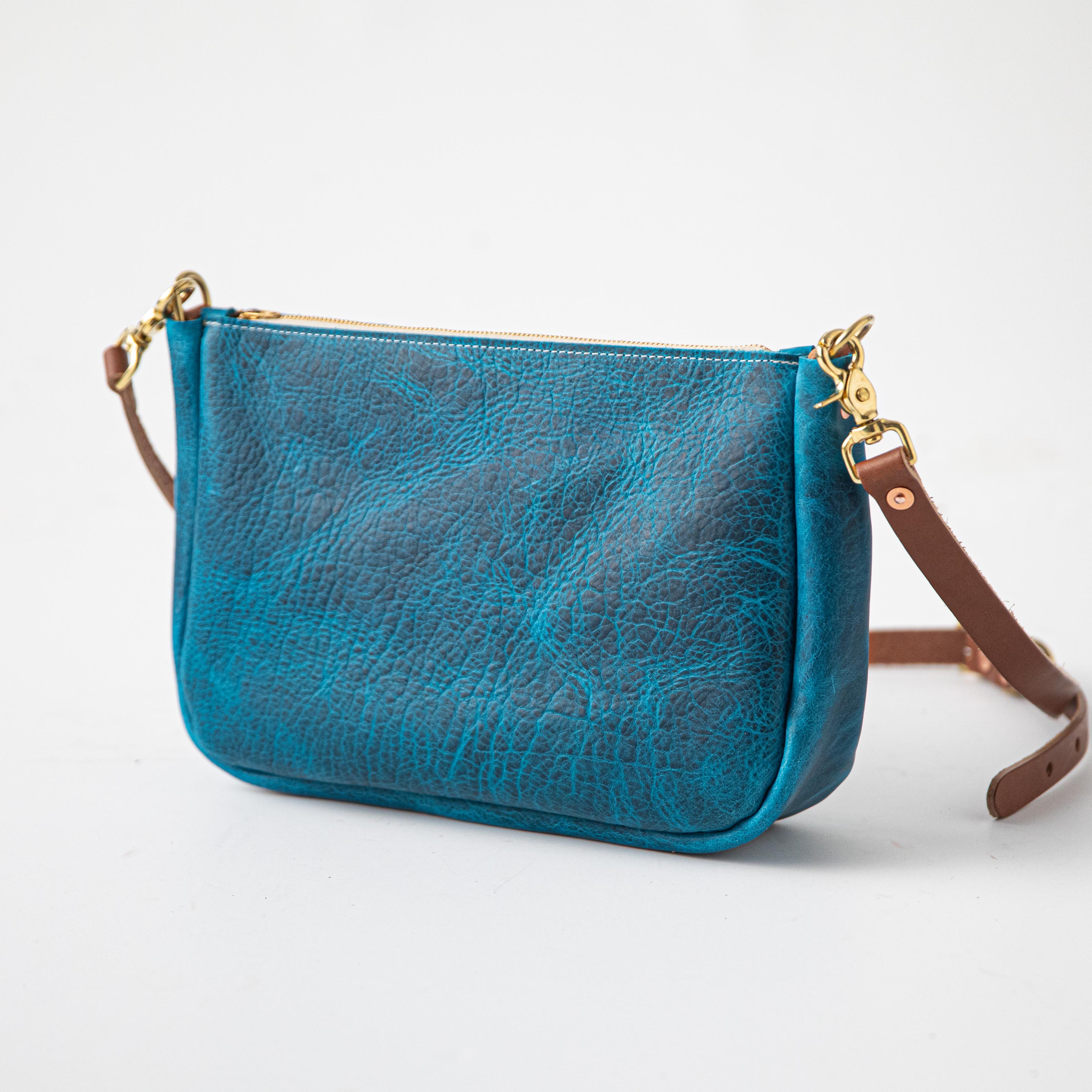 Petrol Blue Bison Crossbody Bag, handcrafted full-grain leather with a solid brass zipper and D-rings.