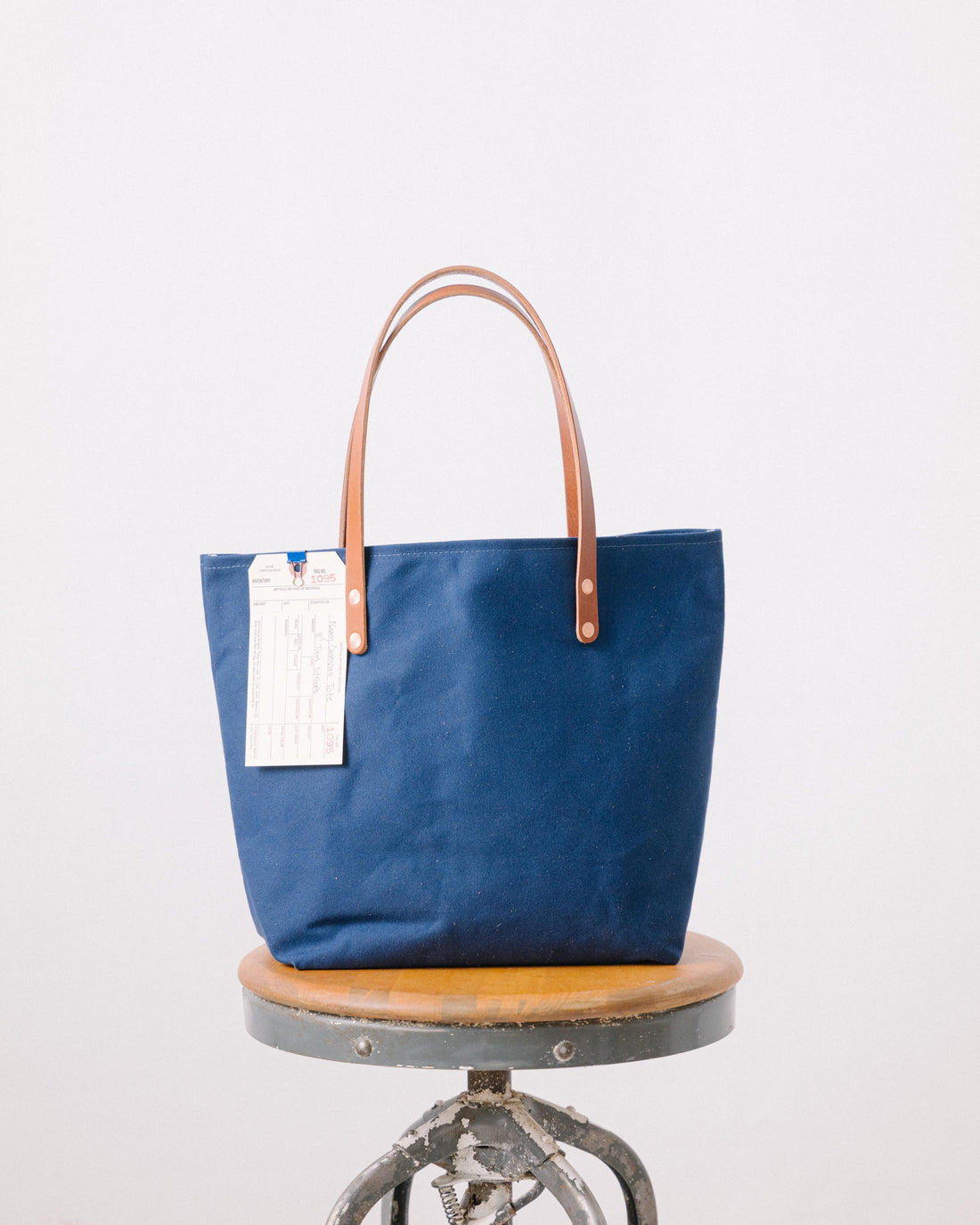 1095 Navy Canvas Tote - 7” Tan Handles