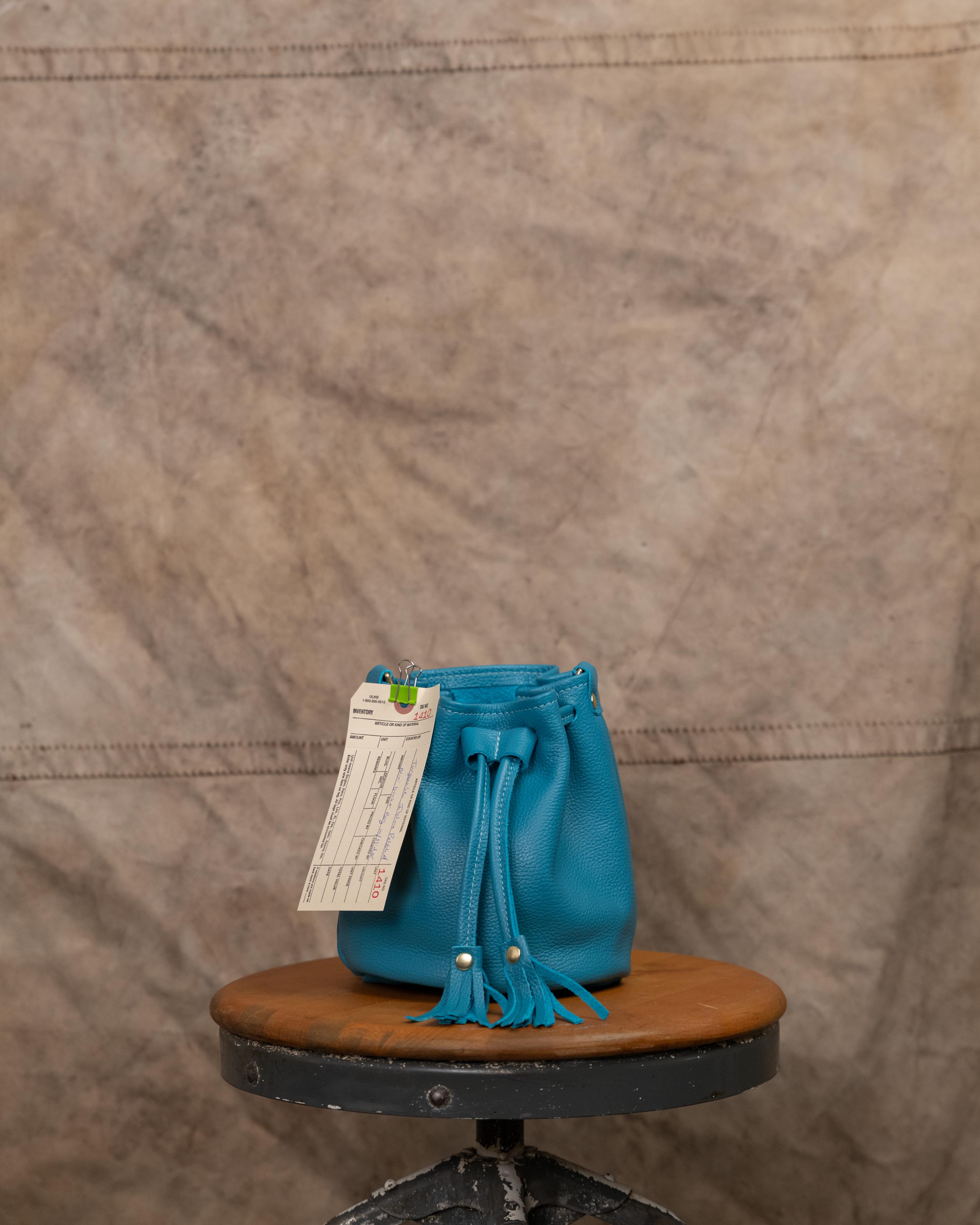 1410 Turquoise Italian Pebbled Mini Bucket Bag w/ Slider Strap