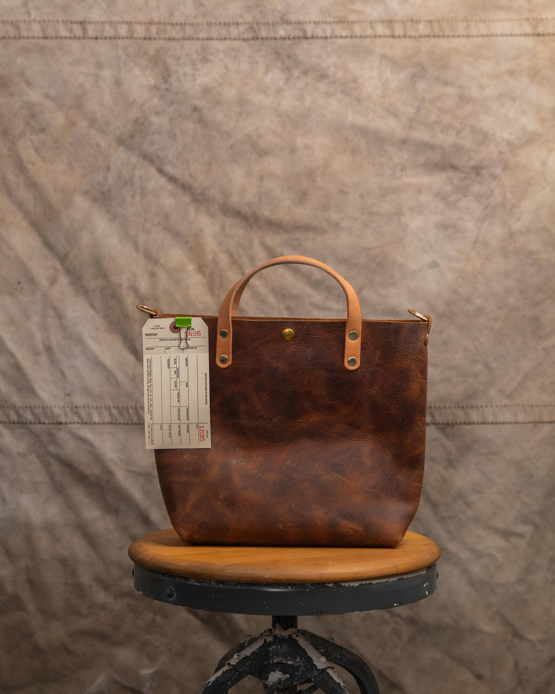 1695 Scratch-and-dent Rustic Tan Mini Tote with Brass rivets and D-rings