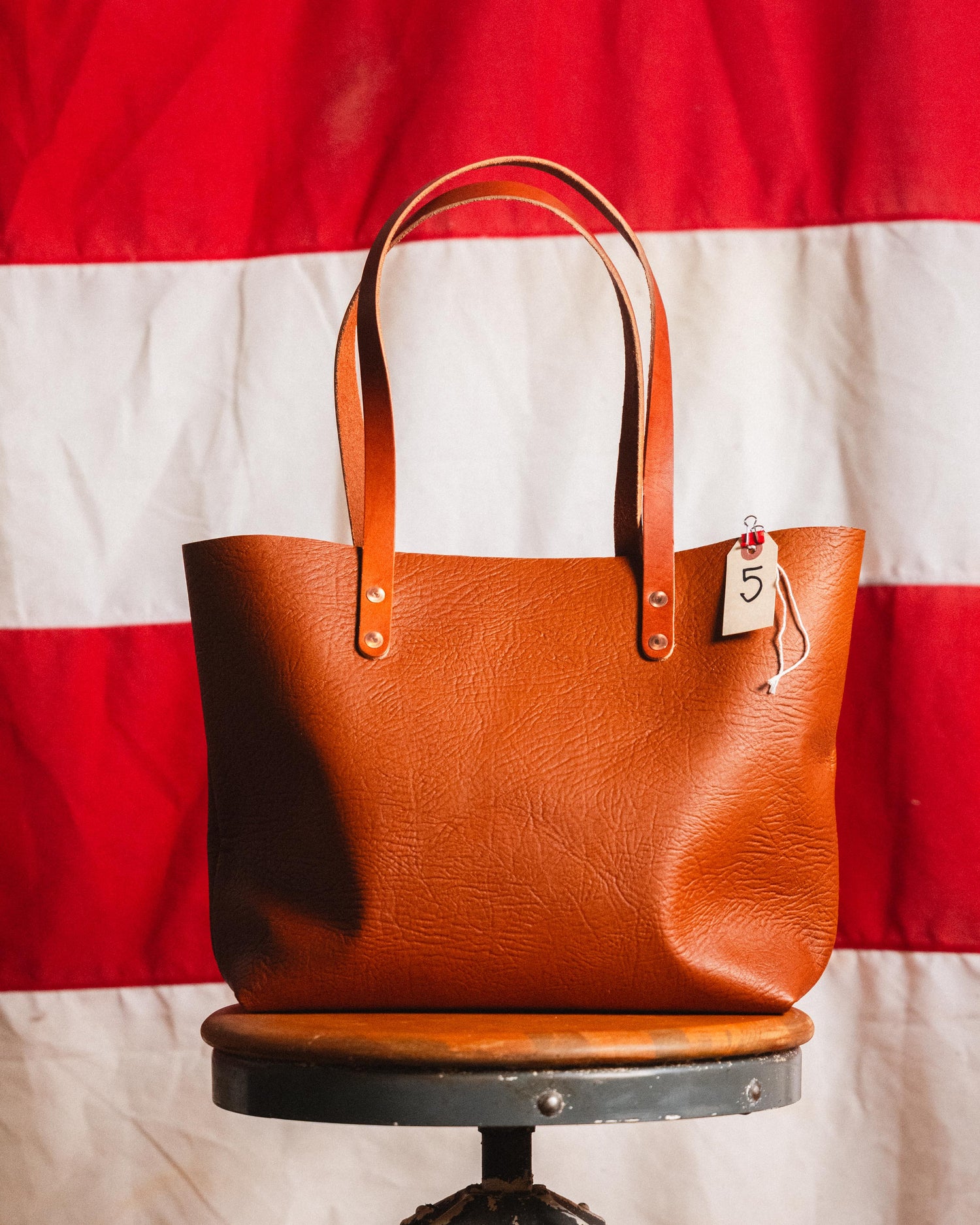 5. Tan Bison East West Tote 10” handles