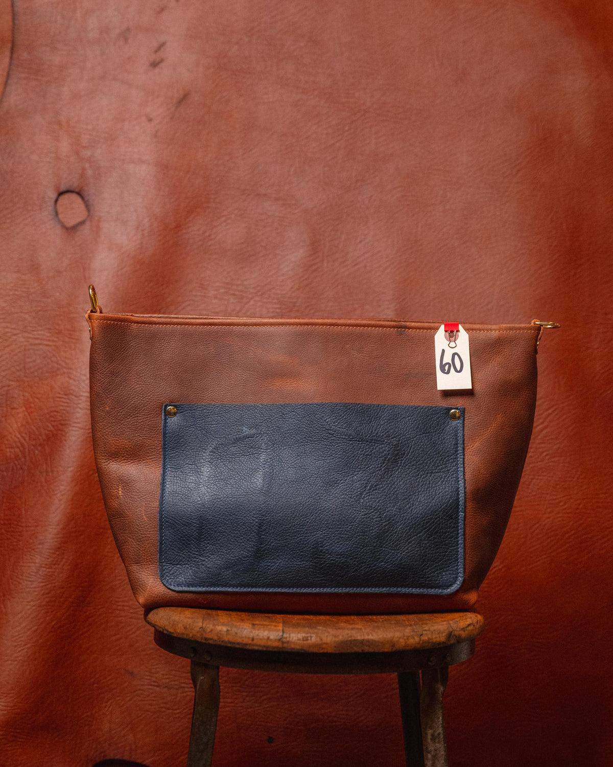 60. Brown / Navy Kodiak East West Crossbody Panel Tote with Branded pocket