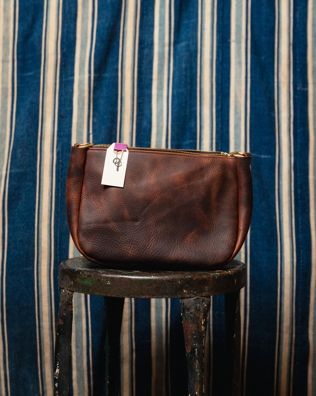10. Brown Kodiak Medium Crossbody Bag