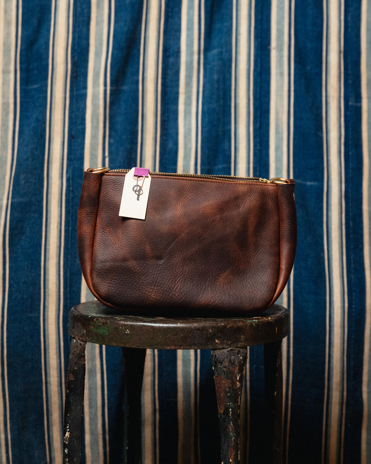 10. Brown Kodiak Medium Crossbody Bag