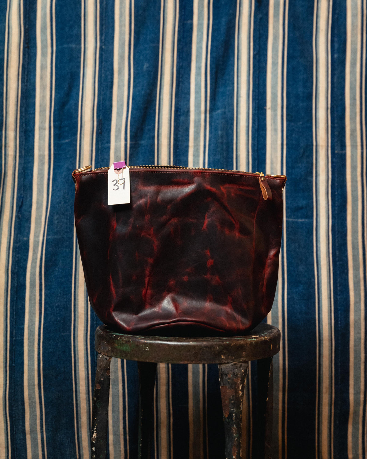 37. Violet Rustic Bison Zip Top Bucket Bag