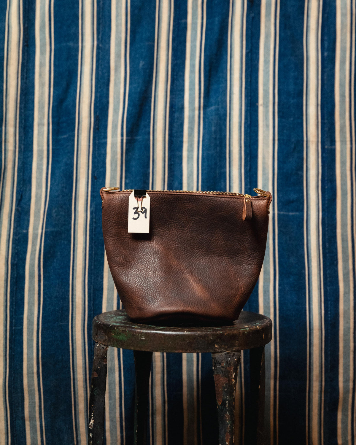 39. Brown Kodiak Mini Zip Top Bucket Bag