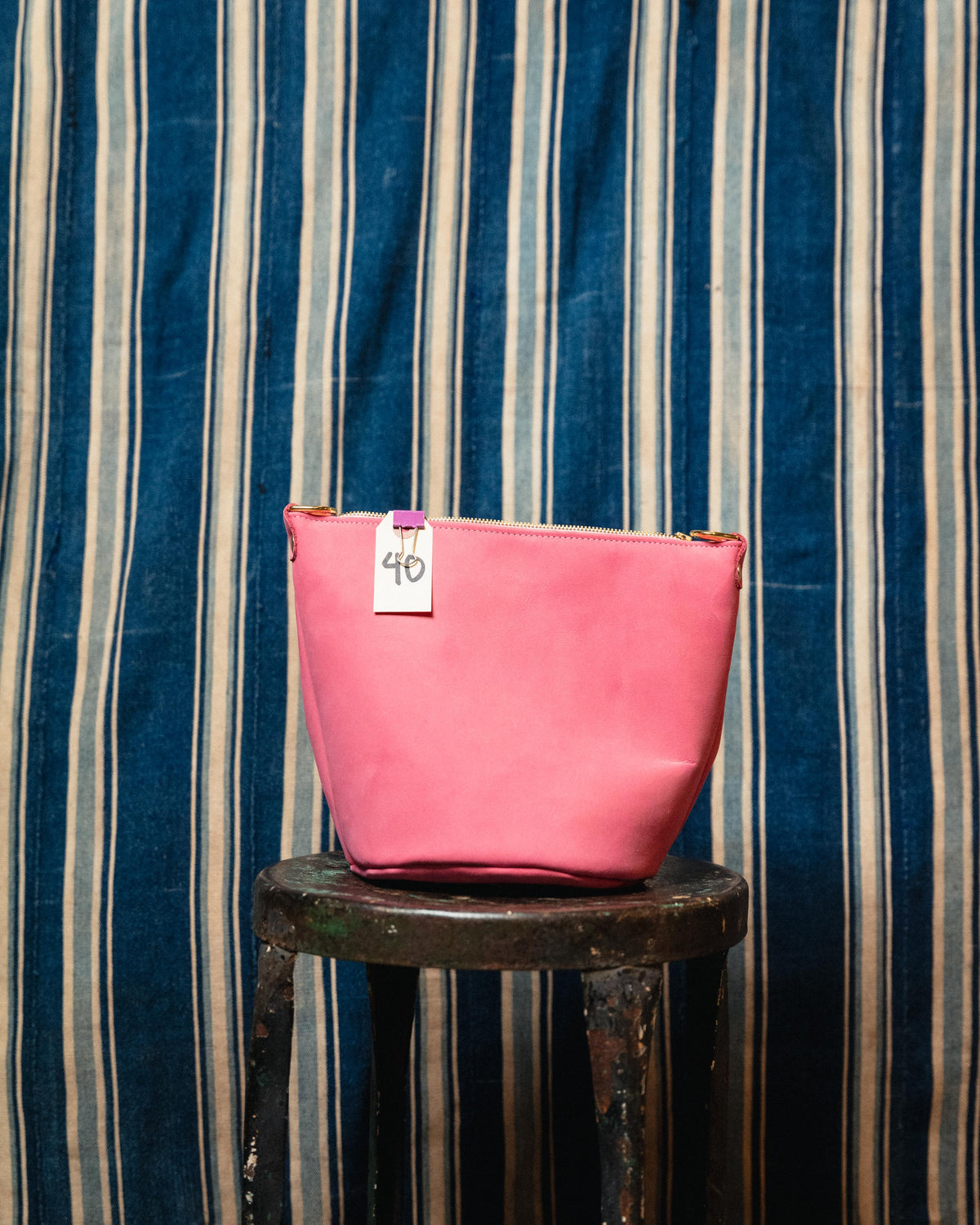 40. Pink Suede Mini Zip Top Bucket Bag