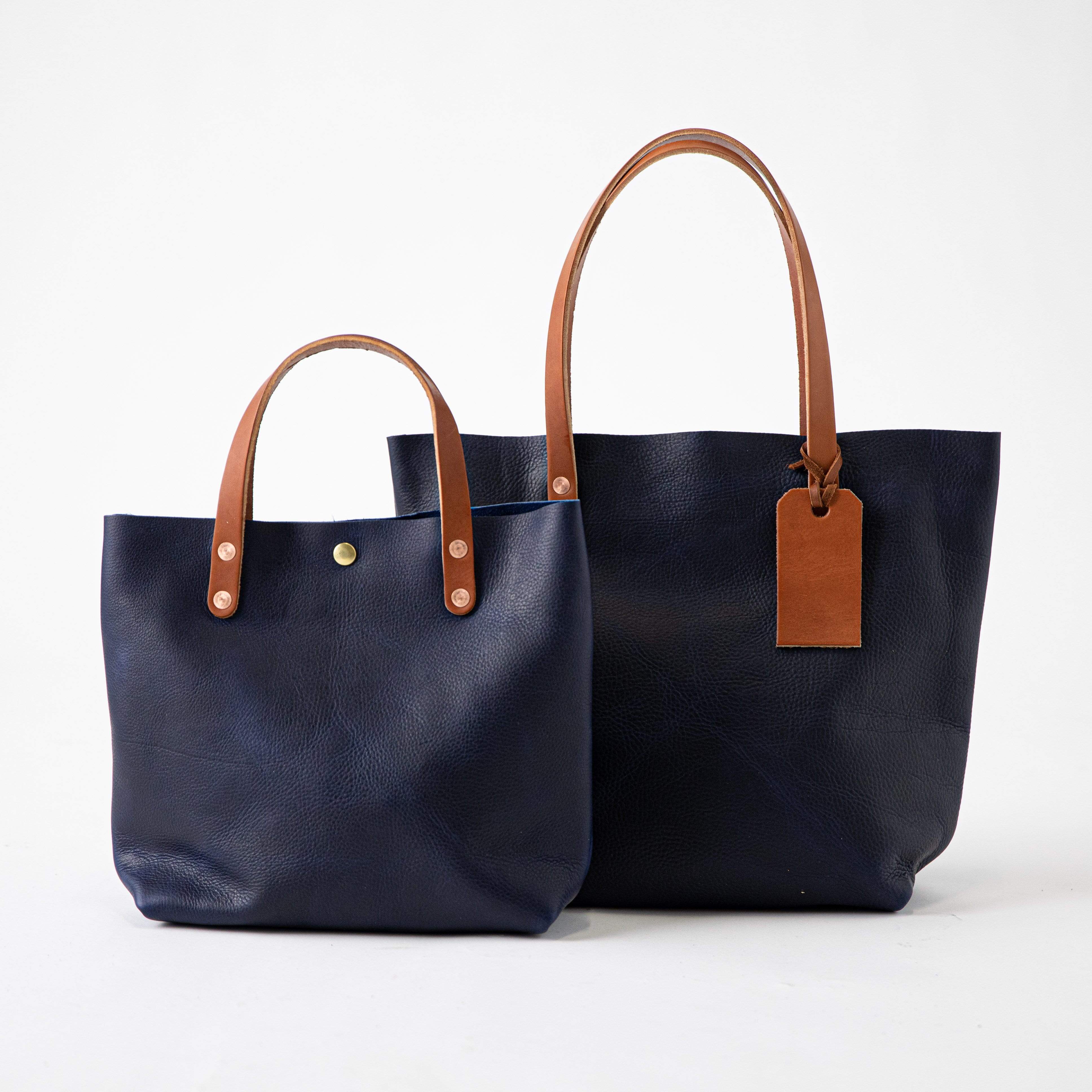 Navy and tan bag on sale