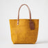 Vibrant Yellow Bison leather tote bag with Tan handles and a brown leather tag.