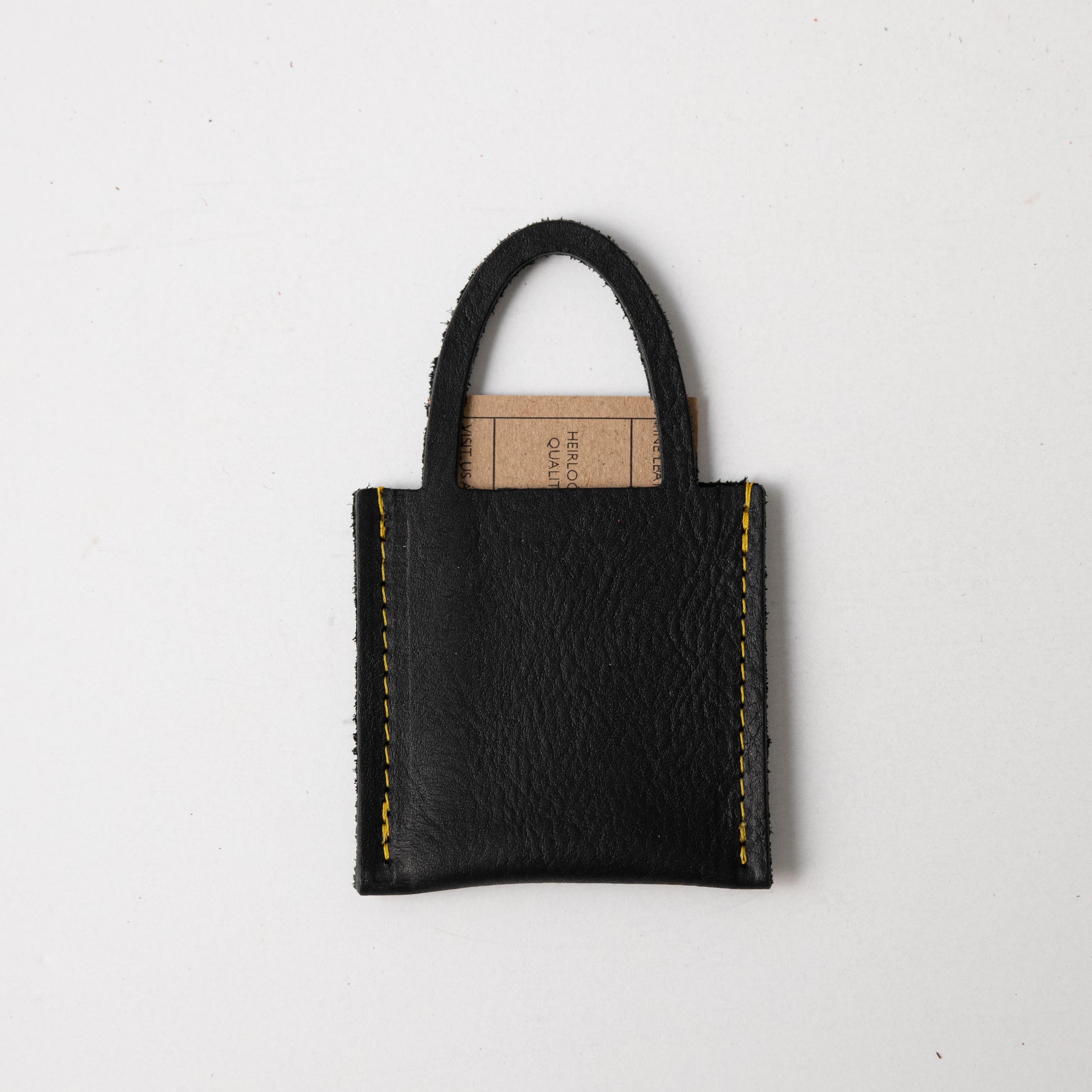 Tiny hotsell black bag