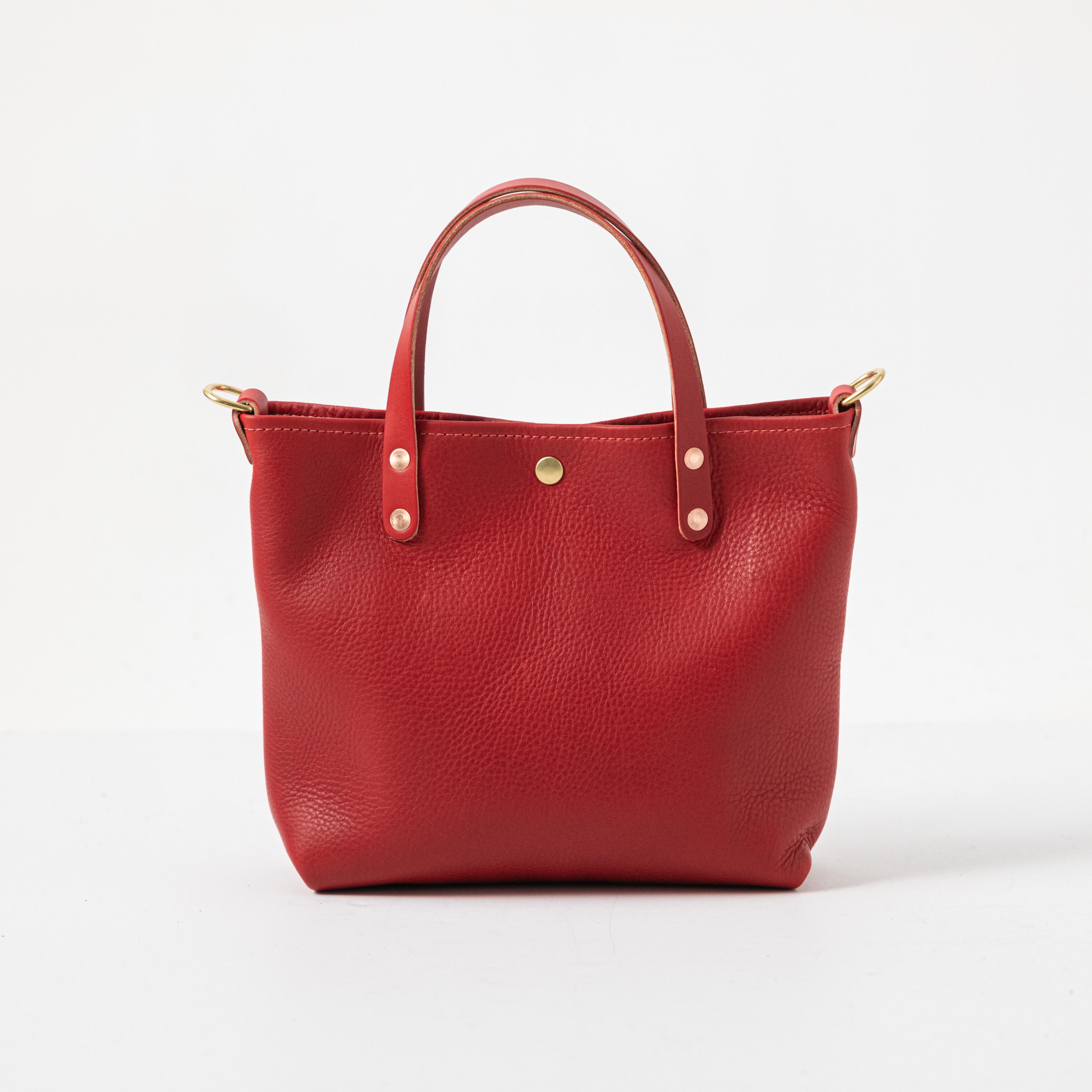 The leather mini traveler tote online bag